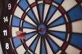 Dart hitting the center bull`s eye Royalty Free Stock Photo