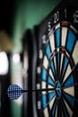 Dart hitting the center bull`s eye Royalty Free Stock Photo