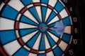 Dart hitting the center bull's eye