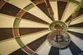 Dart hitting on center with bitcoin on dartboard for business concept. Royalty Free Stock Photo