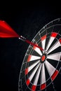 Dart hitting red target in the center of dart. Generative AI
