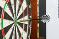 Dart sticking out of a darts board