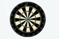 Dart strikes the bulls-eye of a dartboard Royalty Free Stock Photo