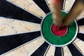 Dartboard with Steeldarts in bullseye Royalty Free Stock Photo