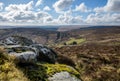 Dartmoor national park, Scenic path on a bright spring morning. Lovely granite rocks captured on the trail up to the ancient stone