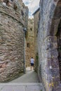 Man walking in Dartmounth Castle Royalty Free Stock Photo