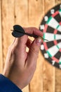 Darts game. Throwing darts at the target Royalty Free Stock Photo