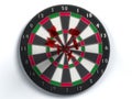 Darts hitting bulls eye