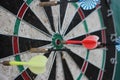 Darts target closeup. Success hitting target aim goal achievement concept