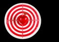 Darts target with heart on black