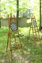 Darts targets on easels in garden. Royalty Free Stock Photo