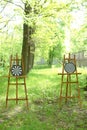 Darts targets on wooden easels in forest. Royalty Free Stock Photo