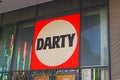 Darty logo, shop electronic retail french store building, France