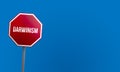 Darwinism - red sign with blue sky Royalty Free Stock Photo