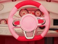 Dashboard baby pink car.