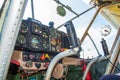 Dashboard in cockpit with analog guages of old private plane. Closeup engine control panel in vintage personal airplane Royalty Free Stock Photo