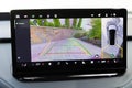Dashboard display screen with multimedia and 360 camera view in a new luxury vehicle. Front camera of circular 360 degrees view Royalty Free Stock Photo