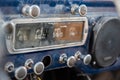 Dashboard at front of abandoned vintage truck with ammeter, oil indicator, various knobs Royalty Free Stock Photo