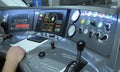 Dashboard of the passenger train, start lever, control panel, instruments, driver arm, screen, monitor Royalty Free Stock Photo