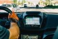 Dashboard View And GPS Map Of Modern Car With Hands Of Driver On Steering Wheel Royalty Free Stock Photo