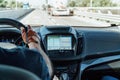 Dashboard View And GPS Map Of Modern Car With Hands Of Driver On Steering Wheel Royalty Free Stock Photo