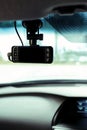 Dashcam or car camera mounted on front windshield to record situation or accident ahead