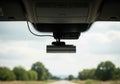 Dashcam is mounted on the windshield of a vehicle, capturing footage Royalty Free Stock Photo
