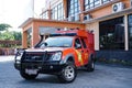 A dashing rescue team car Basarnas in front of the office, using the strobist concept