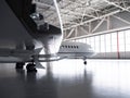 Dassault Falcon Business Jet in Hangar Royalty Free Stock Photo