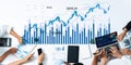 Data Analysis of Financial Trends with Charts, Graphs, and Diverse Hands Using Laptops and Devices to Analyze Stock Royalty Free Stock Photo