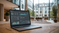 Data analytics and business intelligence dashboard displayed on a laptop in a modern office setting Royalty Free Stock Photo