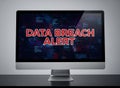 Data Breach Alert Displayed on Computer Monitor Royalty Free Stock Photo