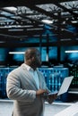 Data center admin running system diagnostic tests, automating anomaly detection Royalty Free Stock Photo