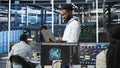 Data center engineer does node tree programming to optimize resource allocation Royalty Free Stock Photo