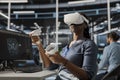 Data center engineer running diagnostic scripts using VR headset Royalty Free Stock Photo