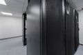 Data Center With Multiple Rows of Fully Operational Server Racks. Modern Telecommunications, Cloud Computing, Artificial Royalty Free Stock Photo