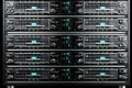 Data center server rack, network technology, digital storage, illuminated lights, background black Royalty Free Stock Photo