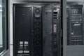 Data center server racks and network equipment in a secure IT room with cooling and cabling Royalty Free Stock Photo