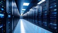 Data center server room with rows of computer racks and blue lighting Royalty Free Stock Photo