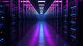 Data Center Server Room with Rows of Rack Mounted Servers and Blue and Purple Lighting Representing Data Storage and Network Royalty Free Stock Photo