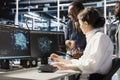 Data center system administrators using artificial intelligence Royalty Free Stock Photo