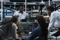 Data center system administrators using PC to visualize AI neural networks Royalty Free Stock Photo