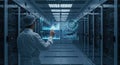 Data Center Technician Interacting with Digital Interface in Server Room Royalty Free Stock Photo