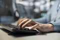 Data center technician typing on PC keyboard Royalty Free Stock Photo
