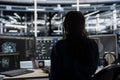 Data center technician uses AI visualization tool on PC to oversee tasks Royalty Free Stock Photo