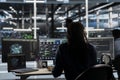 Data center worker using AI deep learning algorithms to analyze large datasets Royalty Free Stock Photo