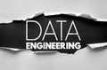DATA ENGINEERING concept. Information technology, analytics, and processing design under torn paper symbolizing data architecture Royalty Free Stock Photo