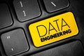 Data engineering - software engineering approach to designing and developing information systems, text button on keyboard Royalty Free Stock Photo