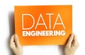 Data engineering - software engineering approach to designing and developing information systems, text on card concept background