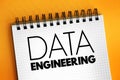 Data engineering - software engineering approach to designing and developing information systems, text concept on notepad Royalty Free Stock Photo